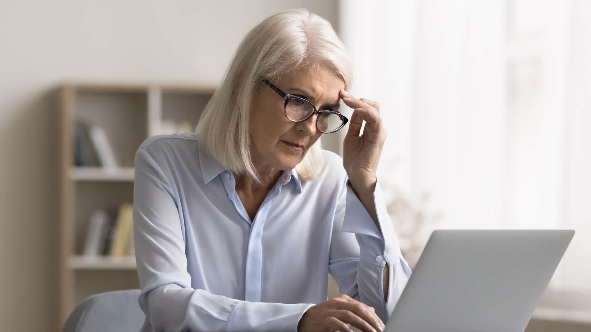 data analyst working on her computer